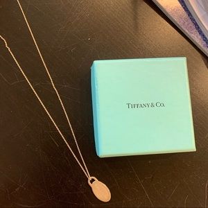 Return to Tiffany oval tag charm, sterling silver